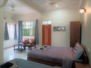 Кровать или кровати в номере Kanvas Suites - Sun N Moon