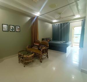 Гостиная зона в Kanvas Suites - Sun N Moon