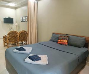 Кровать или кровати в номере Kanvas Suites - Sun N Moon