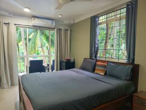 Кровать или кровати в номере Kanvas Suites - Sun N Moon