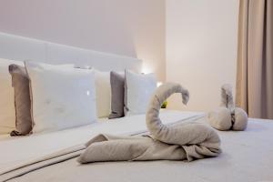 Łóżko lub łóżka w pokoju w obiekcie Bright & Stylish Apartment in Chipeque, Los Cristianos