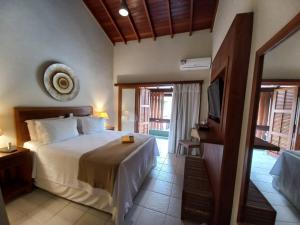 Cama ou camas em um quarto em Hiu Hotel