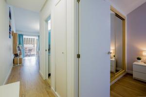 Łóżko lub łóżka w pokoju w obiekcie Bright & Stylish Apartment in Chipeque, Los Cristianos