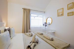 Łóżko lub łóżka w pokoju w obiekcie Bright & Stylish Apartment in Chipeque, Los Cristianos