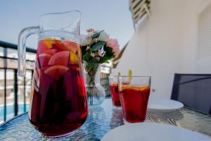Napoje w obiekcie Bright & Stylish Apartment in Chipeque, Los Cristianos