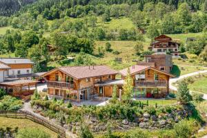 an aerial view of a home with a mountain at Uralp Royal by A-Appartments in Brand