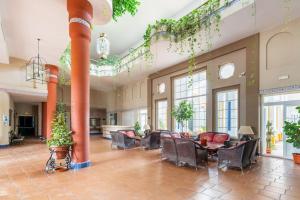 Posezení v ubytování GINVA - Apartahotel El Rocio-Doñana + 4 fotografie