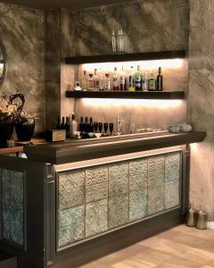Lounge nebo bar v ubytování Hotel Le Corderie