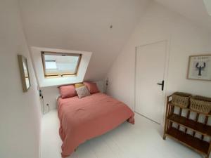Posteľ alebo postele v izbe v ubytovaní adorable appartement à deux pas de la plage