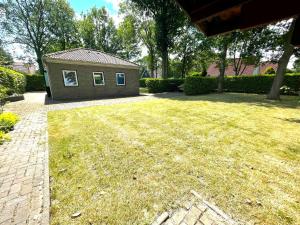 Zahrada ubytování Vakantiebungalow Deltona