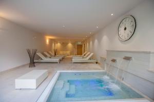 Voodi või voodid majutusasutuse Parkhotel Delta, Wellbeing Resort toas