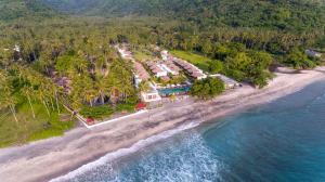 an aerial view of a resort on the beach at Living Asia Resort and Spa in Senggigi