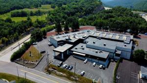 an overhead view of a building with a parking lot at Holiday Inn Scranton East - Dunmore, an IHG Hotel in Dunmore