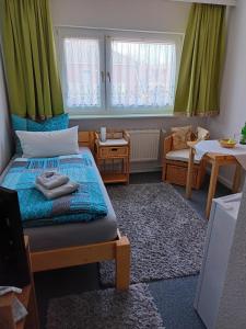 Postel nebo postele na pokoji v ubytování Pension Abendsonne