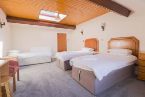 Falcon's Nest Hotel客房内的一张或多张床位