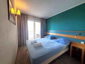 Posteľ alebo postele v izbe v ubytovaní CAP HERMES Vue MER Magnifique logement 6 couchages