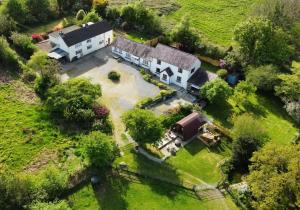 an aerial view of a house with a yard at Blaencwm Cottages in Boncath