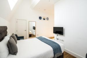 Postel nebo postele na pokoji v ubytování Equitable Hotel