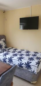 Postel nebo postele na pokoji v ubytování Hôtel Harbonnières