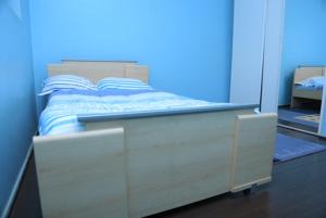 Postel nebo postele na pokoji v ubytování RugsResidence
