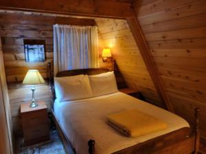 Letto o letti in una camera di Cabin In The Woods