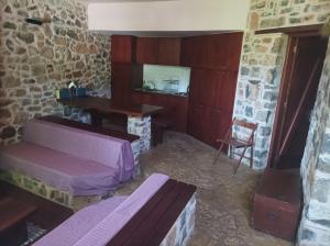 Postel nebo postele na pokoji v ubytování ΕΥμορφο σαν Παραμύθι ΤΗΛΙΑ