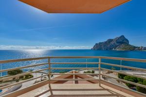 a view of the ocean from the balcony of a house at Estudio Loft Horizonte Playa Fossa Calpe in Calpe