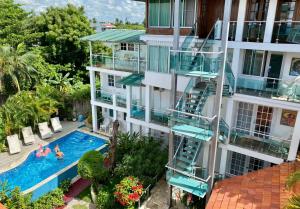 Bazén v ubytování Hotel Neptuno Refugio nebo v jeho okolí