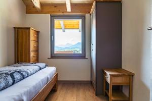 Ένα ή περισσότερα κρεβάτια σε δωμάτιο στο Gästehaus Beim Huber +74 φωτογραφίες