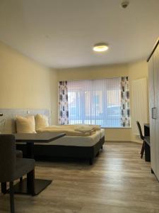 Ένα ή περισσότερα κρεβάτια σε δωμάτιο στο Landhotel Vosse-Schepers