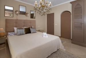 Postel nebo postele na pokoji v ubytování Villa in Puerto Cabopino