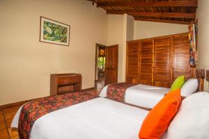 Voodi või voodid majutusasutuse Nandel Beach Resort toas