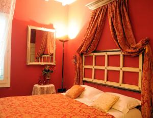 Postel nebo postele na pokoji v ubytování B&B A Casa Dell'Antiquario