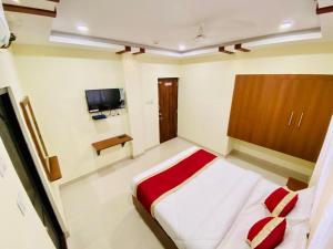 Prabhuvihar Residency的电视和/或娱乐中心