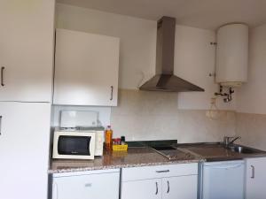 Kuchyň nebo kuchyňský kout v ubytování Casa la Era