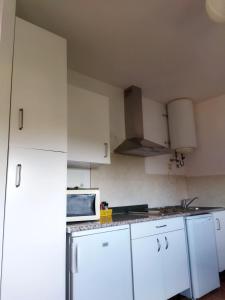 Kuchyň nebo kuchyňský kout v ubytování Casa la Era