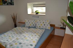 Postel nebo postele na pokoji v ubytování Appartement Thermenzeit