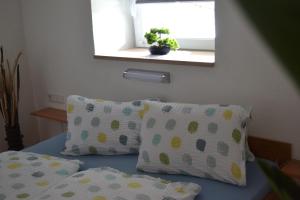 Postel nebo postele na pokoji v ubytování Appartement Thermenzeit