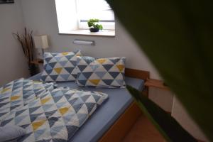 Postel nebo postele na pokoji v ubytování Appartement Thermenzeit