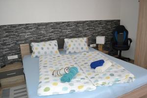 Postel nebo postele na pokoji v ubytování Appartement Thermenzeit