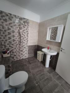 Koupelna v ubytování kaite house