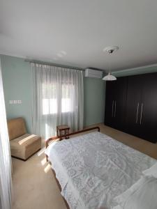 Postel nebo postele na pokoji v ubytování kaite house