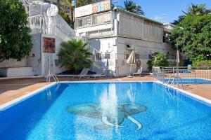 Der Swimmingpool an oder in der Nähe von in the heart of Playa del Inglés