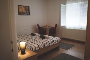 Posteľ alebo postele v izbe v ubytovaní Apartman Viljevac, Donji Miholjac