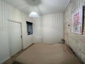 Posteľ alebo postele v izbe v ubytovaní Loft atypique Dunkerque Centre
