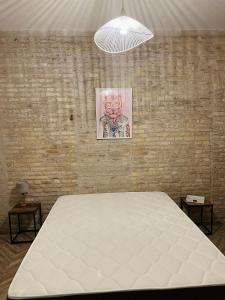 Posteľ alebo postele v izbe v ubytovaní Loft atypique Dunkerque Centre