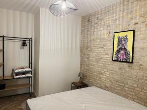 Posteľ alebo postele v izbe v ubytovaní Loft atypique Dunkerque Centre