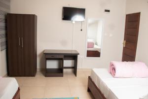 Foto dalla galleria di El-King Home Lodge a Afwerasi