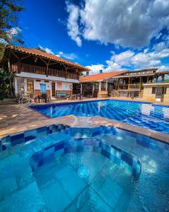 Bazén v ubytování Eco Hotel las Palmas nebo v jeho okolí