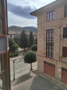 a view from the window of a building at Apartamento Parque Europa in Ezcaray